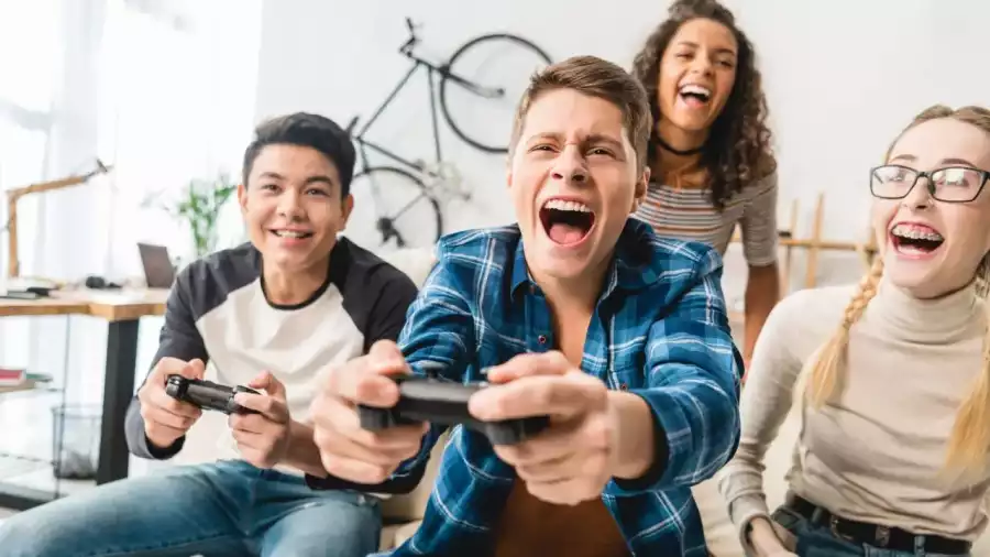 nastolatki grają na konsoli